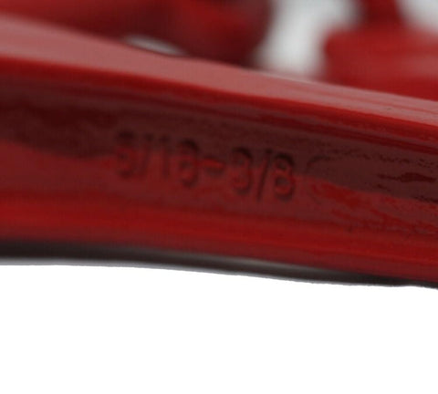Close-up of 5/16-3/8 marking on red ratchet binder from Heavy Duty Grade 70 Chain And Binder Kit With Four Five Sixteenth Inch Twelve Foot G70 Transport Chains And Four Ratchet Binders With Grab Hooks 4700 Lb Working Load Limit Each Ideal Flatbed Truck Trailer Tie Down Gear