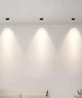LED Recessed COB Spotlight installed in ceiling, showcasing soft light on wall, ideal for accent lighting.