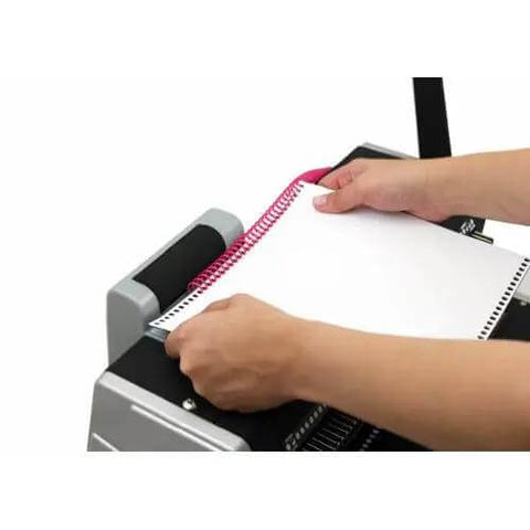 Using CoilMac-ER Plus Manual Coil Punch With Electric Inserter to bind papers with pink coil, 54 Disengageable Pins, precise binding tool