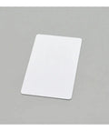 Top Shelf Waterproof Blank Inkjet Cards For Crisp Id Badges And Pro Business Cards Clean Matte White Finish on gray background.