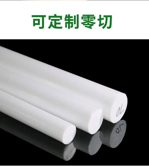 Customizable Rod With Virgin PTFE Material, Chemical Resistant, Diameter 15mm And Length 1000mm, shown laid on reflective surface.