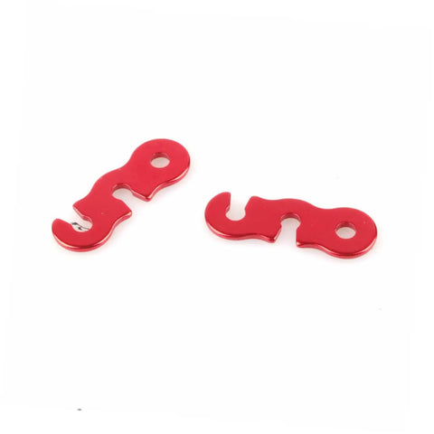 Two red six piece aluminum cord buckles for tent ropes quick knot adjusters antislip outdoor gear on white background.
