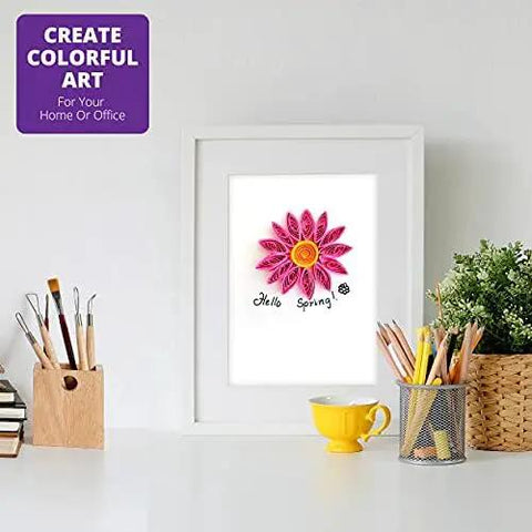 Framed quilled flower art on desk, part of the Beginner Quilling Kit For Kids And Adults With Tools, Easy Step By Step Instructions.
