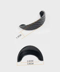 Four Piece Backup Camera Rain Shields For Tesla Cybertruck solid weatherproof lens covers, black rubber design, 2.6CM by 3.8CM size.