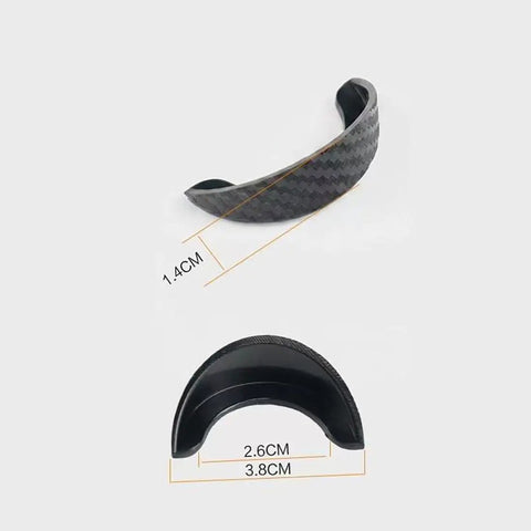 Four Piece Backup Camera Rain Shields For Tesla Cybertruck solid weatherproof lens covers, black rubber design, 2.6CM by 3.8CM size.