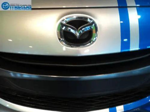 Mazda Front Logo Emblem C235 51 731A Replacement For 2006 2013 Mazda2 Mazda3 Mazda5 And Mazda6 Direct OEM Factory Original Part installed on car