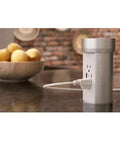 Slick Motorized Pop Up Kitchen Countertop Outlet With Fast Usb Charging And Dual Wall Jacks Heavy Duty Silver Build mounted in a kitchen countertop.