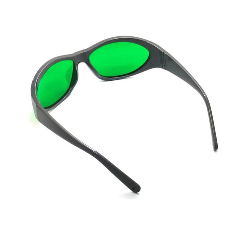 OG Grade Red Laser Protective Glasses For 620 To 700nm Range OD6 Plus Safety Goggles with green lens, side view.
