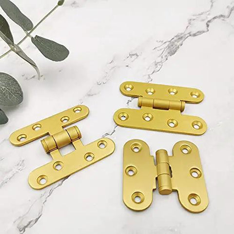 Five Pcs Brushed Brass Deco Furniture Hinges Set Versatile Miniature Door Hinges flat lay view on marble surface
