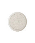Circular self adhesive PVC furniture pad for hardwood and tile, shown with textured surface, quiet glide cushion. Keep floors safe and quiet.