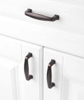 10 Pack Three And A Half Inch Oil Rubbed Bronze Cabinet Pulls With Three Inch Center To Center Mounting Holes Installed on White Cabinets