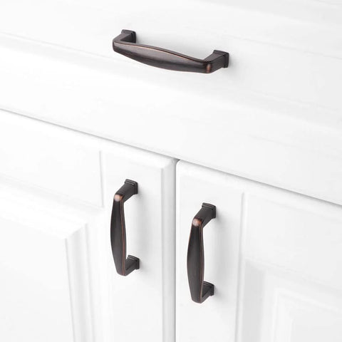 10 Pack Three And A Half Inch Oil Rubbed Bronze Cabinet Pulls With Three Inch Center To Center Mounting Holes Installed on White Cabinets