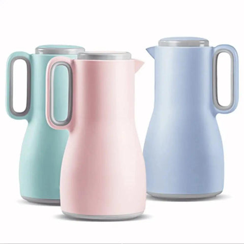 Grab And Go Kickass Vacuum Insulated Travel Thermos With Secure Silicone Lid Locks In Scalding Heat Or Ice Cold Temperatures All Day Long Killer For Daily Commutes, featuring three stylish pastel-colored bottles.