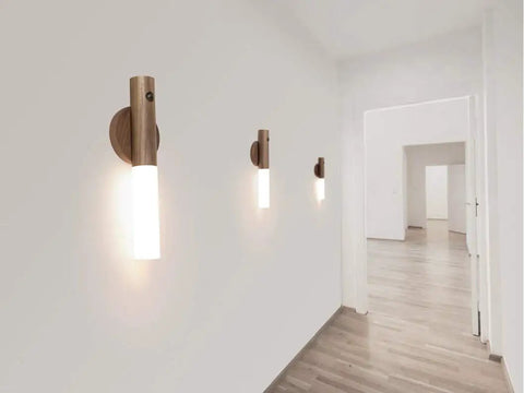 Smart LED Battery Powered Wall Sconce With Motion Sensor And Stick On Night Light in modern hallway