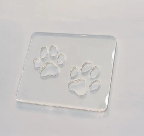 Badass Double Paw Print Router Template For Heavy Duty Woodworking Resin Inlay Cavities Clear Quarter Inch Acrylic Stencil Tracing Guide on white background.
