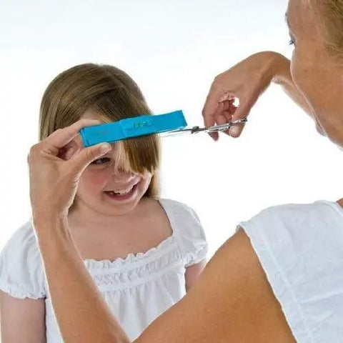 Effortless Home Hair Cutting Guide Designed For Lowkey Perfect Bangs And Seamless Salon Quality Diy Trimming Tool Set Of Two For All Hair Types Zero Hassle Quick Fix. A woman using a hair cutting shield to trim a girl's bangs.