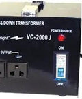 Front view of 2000 Watt Step Up And Down Voltage Converter For 100V And 120V Systems Heavy Duty Transformer with plug and outlets