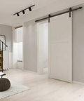 Amazon Basics Sliding Barn Door Hardware Kit 6.6 Foot J Shape Matte Black Carbon Steel 200 Lb Capacity Installed in Room