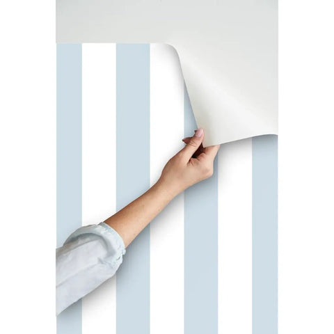 Easy Peasy Peel And Stick Wallpaper Removable Classic Traditional Linen Texture Wallcovering For Renters And Accent Walls, blue and white striped pattern being applied.