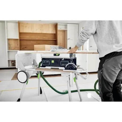 Cordless Table Saw With Battery Powered Circular Blade For Drop Dead Accurate Miter And Parallel Cuts Compact Portable Benchtop Tool in use cutting wood.
