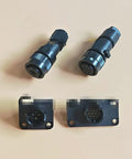 Front view of two black circular servo motor encoder plugs with 10-pin female sockets and matching rectangular panel-mount plates.