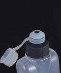 Close-up of the cap on a Curved 400ml Water Bottle For Running And Cycling, Squeeze Cup Ergonomic Sports Flask.