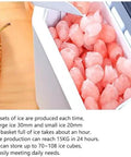 Portable Nugget Ice Maker, Plug And Play Electric Countertop Ice Machine With Free Scoop And Basket, Fast Chill Six Minute Batch filled with ice cubes.