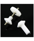 Close-up of 2 Pack Pro Torque Tube Front Drive Gear Set for Trex 450 Helicopter showing white durable precision gears on black background.
