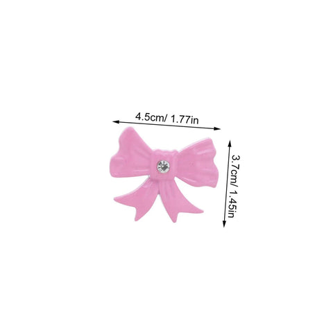 Super Dope Pink Bow Cabinet Pulls Pack Eight Piece Alloy Dresser Knobs For Girls Bedroom Refresh close-up of a pink bow cabinet pull