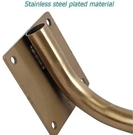 Close-up of the curved gold plated stainless steel leg for furniture, showing attachment plate and high-quality finish.