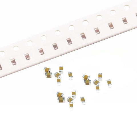 960 Piece SMD Capacitor Kit 0603 0805 1206 MLCC Assortment with 16 values shown with capacitors and tape reel