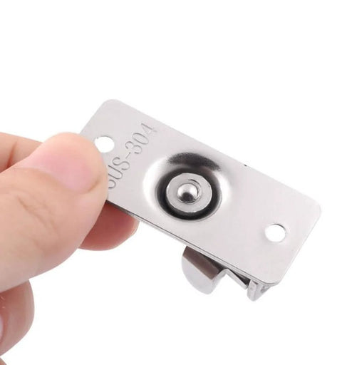 Close-up of stainless steel 90 Degree Right Angle Gate Latches For Barn Doors Windows Garden Gates Cabinets And Sliding Doors
