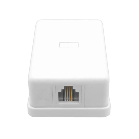 Top Shelf Surface Mount Single Port RJ11 Phone Jack With Four Screw Terminals For Smooth Landline Fax Hookup Hassle Free Install Works Flawlessly On Any Standard White Wall Plate, white ABS housing.