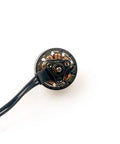 Slick Ultralight Brushless Motor Built Different For FPV Flyers Demanding Crisp Handling On Micro Drones with copper coils and black wire.