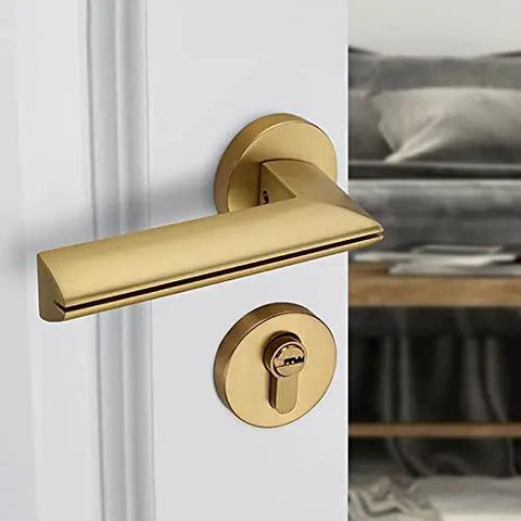 Rock Solid Heavy Duty Zinc Alloy Door Handles With Slick Electroplated Gold Finish For Interior Door Locks on white door.