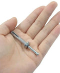 Zinc Alloy Hammer Drive Anchors Quarter Inch By One And A Half Inch Rust Proof Integrated Design For Easy Installation shown in hand