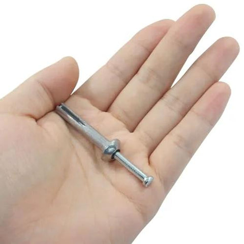 Zinc Alloy Hammer Drive Anchors Quarter Inch By One And A Half Inch Rust Proof Integrated Design For Easy Installation shown in hand