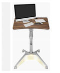 Level Up Your Grind With This Mobile Standing Laptop Desk featuring smooth pneumatic height adjustment and heavy duty rollable casters.
