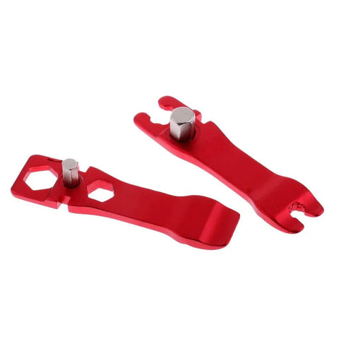 Red compact bike repair tool kit with multiple functions, portable emergency maintenance kit for road bikes, sturdy steel construction.