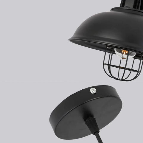 Close-up of Old School Vintage Inspired Round Black Industrial Pendant Light With E27 Socket Wrought Iron Lampshade Retro Chandelier.