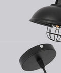 Round Black Vintage Ceiling Lamp With E27 Pendant Chandelier, Wrought Iron Lampshade close-up view on a grey background