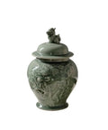 Top Tier Ceramic Airtight Tea Canisters For Loose Tea Leaves And Coffee Beans Hand Embossed Celadon Kirin Design on ceramic jar.