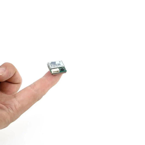 Lit Tiny M10SD 10Hz FPV GPS Compass Module on fingertip, 18mm square, lightweight 4.8g, UBX M10 GNSS chip with built-in QMC5883 compass.