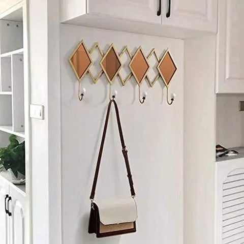 Super Solid Wrought Iron Wall Mount Coat Hook With Drop Dead Gorgeous Glass Accent Sphere Heavy Duty Bracket in a modern setting.