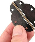 Oval Box Hinge Set 46x35mm 6 Hole Lace Antique Furniture Hardware held in hand showing 6-hole design and metal build.