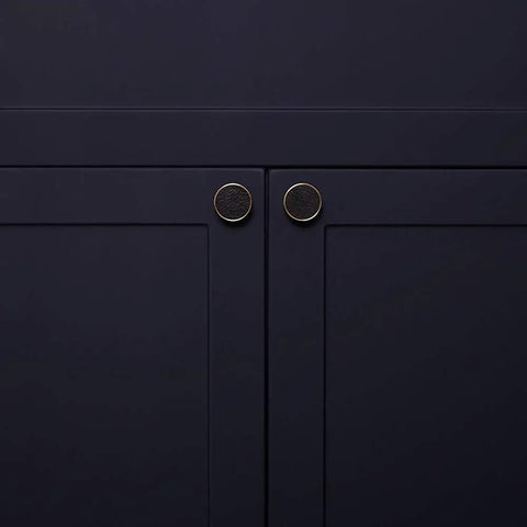 Close-up of cabinet with 10 Pack Brass Round Cabinet Knobs One And One Quarter Inch Diameter Gold Drawer Pulls for Modern Home Decor