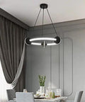 Super Slick Led Pendant Light For Modern Dining Room And Kitchen Hanging Fixture Zero Drama Setup Straight Up Gorgeous Ambient Vibe Minimalist Acrylic Ceiling Lamp in black above a dining table.