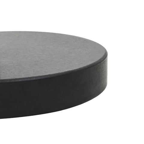 Close-up of Granite Parasol Base Beefy 62.8 Lb Round Black Outdoor Umbrella Stand showcasing solid construction edge