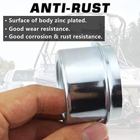 Close-up of chrome trailer hub dust cap held in hand, 1.98-inch for boat trailer axles
