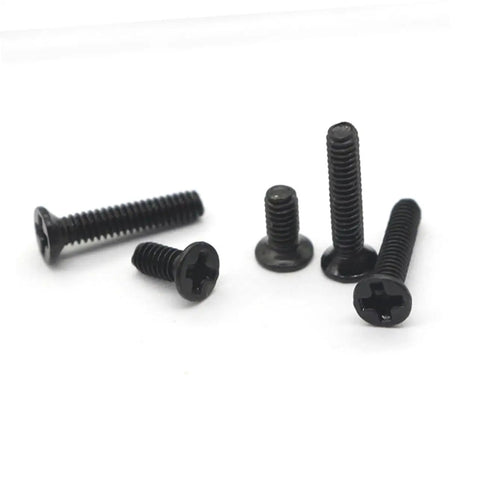 Top Shelf Miniature Small Screw Assortment Kit With Transparent Organizer Box And Tiny Machine Bolts Perfect For Nitty Gritty Repairs And Weekend Projects Gonna Need This One - assorted black machine bolts on white background.